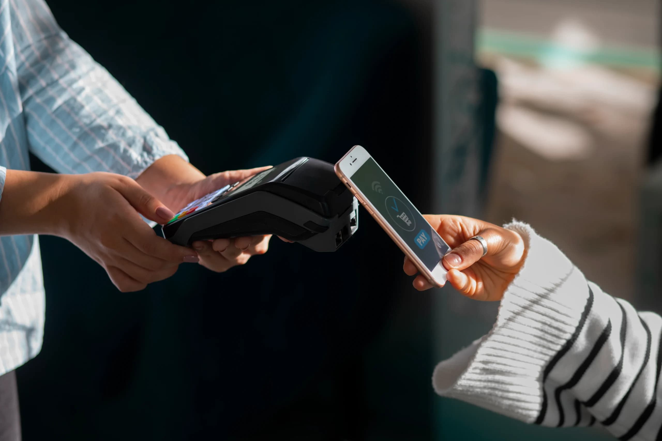person-paying-with-nfc-technology-restaurant