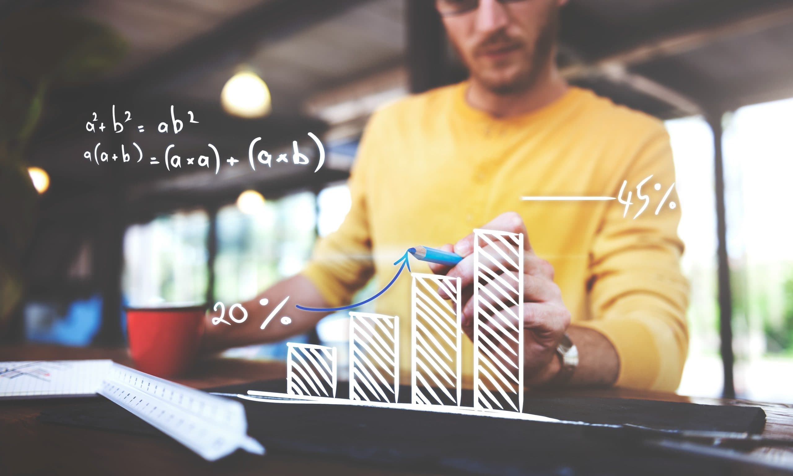 Closeup of man writing arrow up graph increase